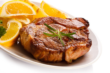 Grilled steak and lemon