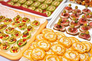 Plate of many mini size sandwich appetizers