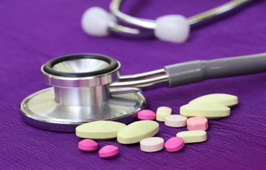 Stethoscope and pills