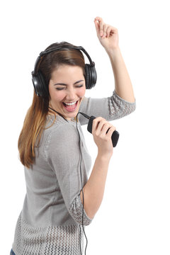 Woman dancing singing and listening to the music