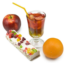 cocktail, orange, apple and cake on a white background