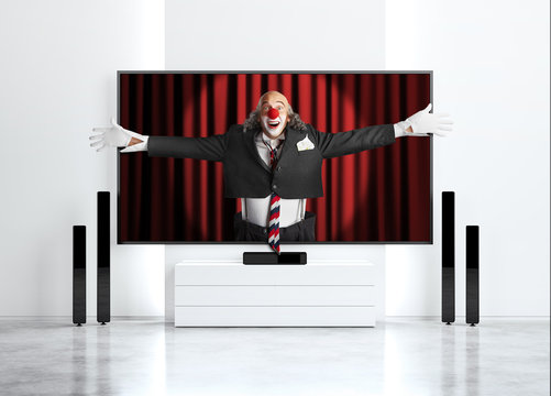 clown reaching from 3D TV screen