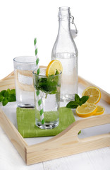 Fototapeta premium mineral water with mint and lemon slice