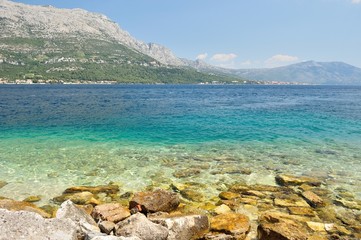 Fototapeta na wymiar Amazing beach with stones in Kocula, Croatia