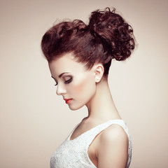 Portrait of beautiful sensual woman with elegant hairstyle.  Per