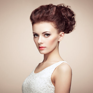 Portrait of beautiful sensual woman with elegant hairstyle.  Per