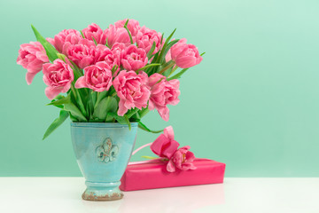 pink tulip flowers and gift box