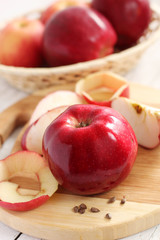 Apples in the basket and on the table