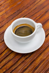 Shot of espresso on table.