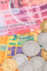 Switzerland money swiss franc banknote and coins close-up (focus