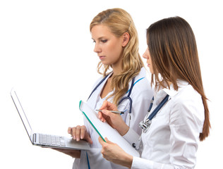 Two woman doctor and nurse research study hold laptop computer