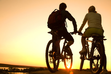 Couple of bicycles on sunset