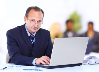 Man working at the office on laptop