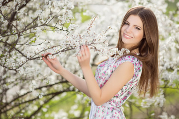 Beautiful teenager girl at green spring nature