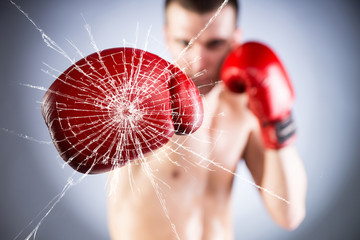 Fighter crushes the glass