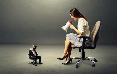 Fototapeta premium woman and small frightened man