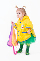 Baby girl in raincoat