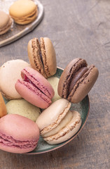 colorful macarons in Blue vintage Bowl , toning