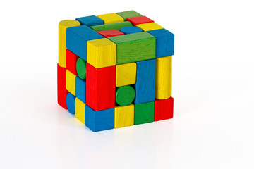 toy blocks jigsaw cube, multicolor puzzle wooden pieces - Powered by Adobe