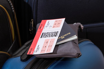 Airline ticket, passport and luggage
