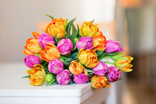 Bunch of tulips lying on the table