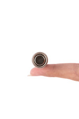 isolated of hand hold is old AA battery on white background