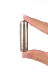 isolated of hand hold is old AA battery on white background