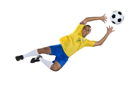 Brazilian Soccer player, jumping, yellow and blue