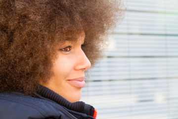 Portrait of a young black woman with afro hair cut