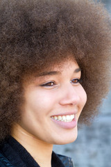 Portrait of a happy girl with afro hair cut