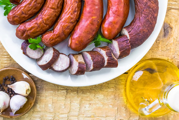 plate full various species sausages