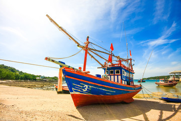 Fototapeta premium Thai fishing wooden boat at Sri Chang island in Thailand