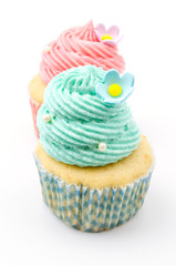 Vanilla cupcakes isolated white background