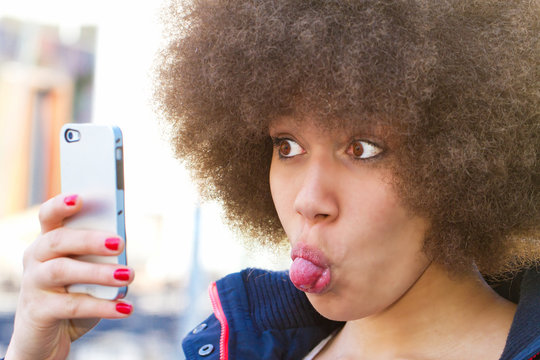 Young woman taking a selfie