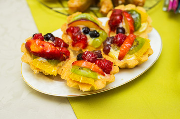 Tasty sweets in the plate