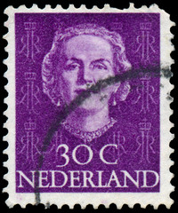 Stamp printed in Netherlands, shows portrait of Queen Juliana