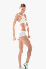 Fototapeta premium young fitness girl underwear exercisers