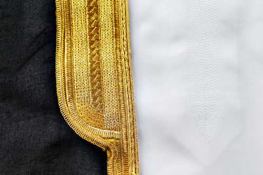 A thawb or kandura is an ankle-length garment worn by Arab men