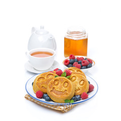 delicious corn pancake with fresh berries, tea and honey