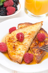 French toast with raspberries and honey, vertical