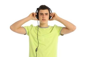 teenager listening to music on white background