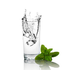 Glass of water and green mint
