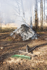 Two rakes and a bonfire
