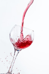Red Wine Pouring into glass