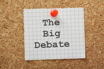 The Big Debate concept on a cork notice board