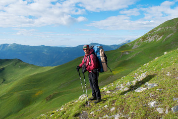Fototapeta na wymiar hiker with backpack in Georgia mountains