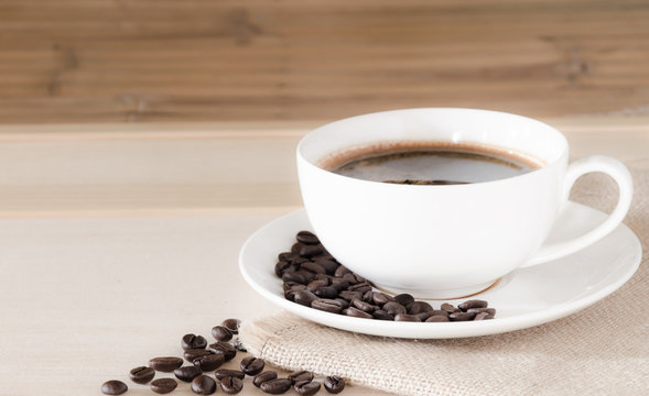 Coffee cup and coffee beans background