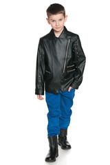 Fototapeta premium Fashion young boy walks