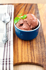 Chocolate ice-cream in porcelain bowl. Closeup.