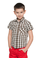 Cute young boy on the white background